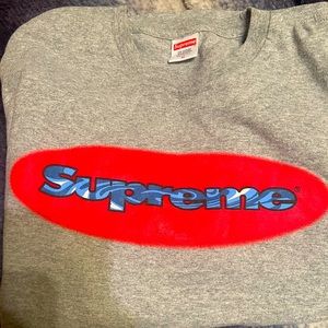 Authentic Supreme long sleeve elliptical logo shirt. Never worn